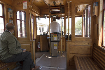 The interior of a streetcar with the motorman driving. Tampa Florida USA. April 2017