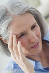 Elderly person with headache