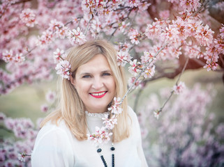 Beautiful woman with flowering tree