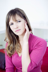 Fototapeta premium Woman suffering from earache