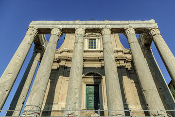 columns in the front of a church in the Roman imperial forum in Rome, Italy.