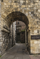 Fototapeta na wymiar Buildings and the 13th Century Medieval wall which surrounds the City of York in northeast England. 