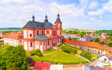 Fototapeta na wymiar Church of The Assumption (1775) in small town Prestice. Architecture from above. Rare baroque monument in Czech Republic, Central Europe. 