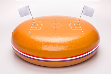 Fußballfeld auf Käse aus Holland mit Fähnchen - Spielstand, Spielergebnis, Spielpaarung