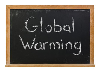 Global Warming written in white chalk on a black chalkboard isolated on white
