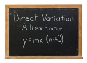 Direct Variation formula written in white chalk on a black chalkboard isolated on white