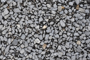Background of pebble gravel nicely spread and evenly lit.