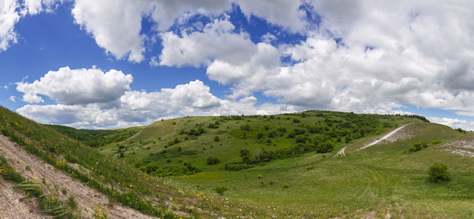 Obraz premium Panoramic view of the hill and the valley. Landscape of the central part of Russia.