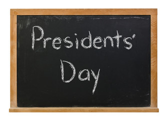 Obraz premium Presidents Day written in white chalk on a black chalkboard isolated on white