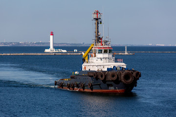 tugboat with fire trunk.