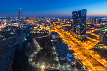 Fototapeta na wymiar Korea city with Beautiful after sunset, Central park in Songdo District, Incheon South Korea.