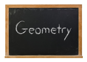 Obraz premium Geometry written in white chalk on a black chalkboard isolated on white