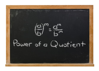 Power of a quotient written in white chalk on a black chalkboard isolated on white