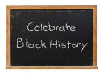 Celebrate Black History written in white chalk on a black chalkboard isolated on white