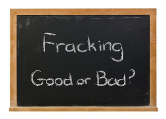 Fracking Good or Bad written in white chalk on a black chalkboard isolated on white