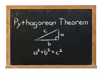 Obraz premium Pythagorean Theorem written in white chalk on a black chalkboard isolated on white 