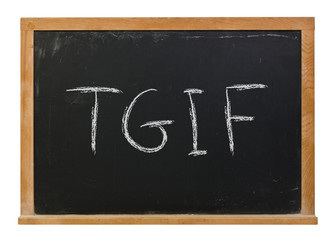 Fototapeta premium TGIF written in white chalk on a black chalkboard isolated on white