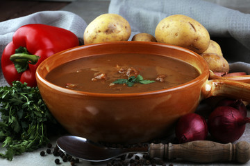Tasty Hungarian beef goulash soup bograch close-up on the table and ingredient