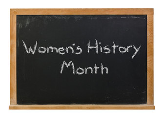 Obraz premium Women's history month written in white chalk on a black chalkboard isolated on white