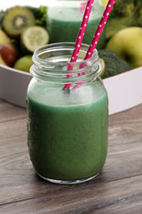 Healthy green smoothie and ingredients - superfoods, detox, diet