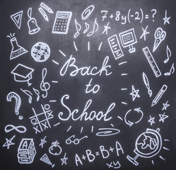 Fototapeta na wymiar drawings on the chalkboard on the new academic year, fall, school supplies