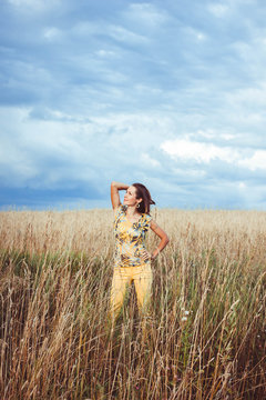 A woman in a rye field