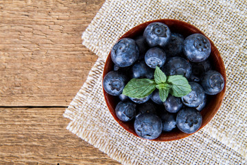 Blueberries on the wooden  background 