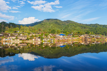 Fototapeta na wymiar Beautiful lake and sky view natural the travel destination of Rak Thai village and mountain reflection in Pai district, Mae Hong Son Province, Thailand. 