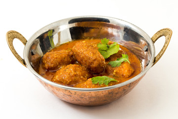 Malai Kofta or meatballs - Traditional Indian food  served in a brass utensil