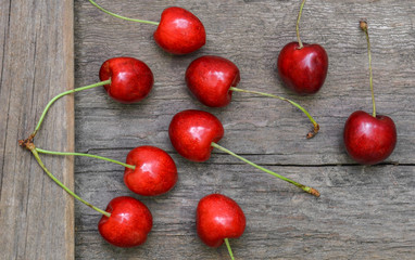 Cherry on wooden background