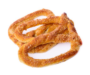 Sweet pretzels on white background