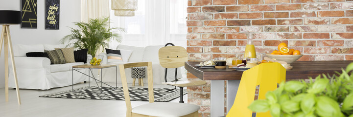 Apartment with brick wall