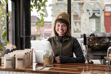 Female employee in cafe, New York, USA