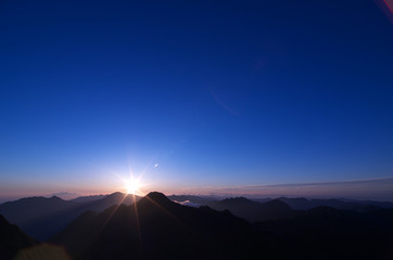 Sunrise seen from the top of Mount Kamegamori, Shikoku,Japan.  - obrazy, fototapety, plakaty