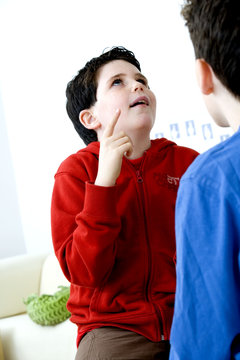 Models Do not use for HIV A young hearing-impaired boy and his brother using the French sign language to discuss with his brother The French sign language uses signs to designate words but also dactylology (each letter of the alphabet is represented by a defined position of the fingers then enabling to spell a word) and the lip reading