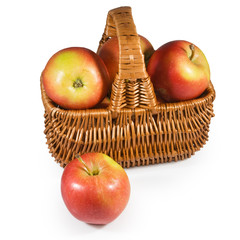 Isolated image of ripe apples in the basket close-up