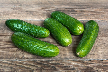 Cucumbers on a wooden background