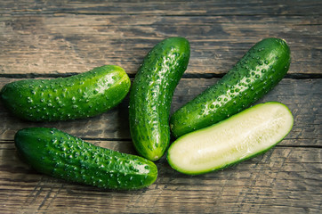 Cucumbers on a wooden background