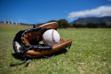 Close-up of baseball and glove