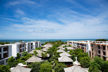 Coastal resort communities with a soothing Sea View overlooking the resort’s lush green landscape from balcony.
