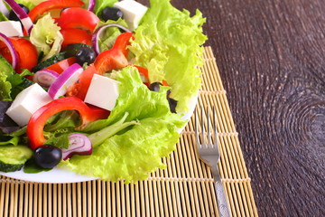 Fresh vegetables on wooden and blur background