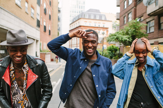 Three Fashionable friends in an urban setting