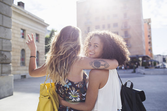 Young wild and free female friends together outdoors