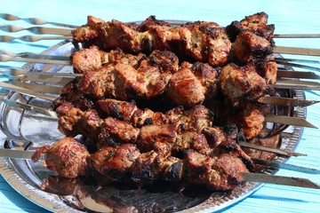 Meat is grilled / Schaschlik / Barbecue cooking