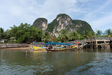 Thai long tail boats at pier