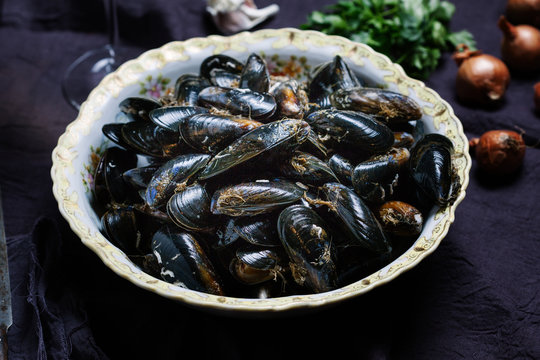 Seafood Mussels ready to be cleaned and de-bearded before cooking