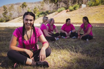 Female trainer relaxing in the boot camp
