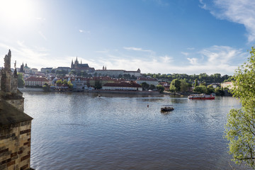 Fototapeta na wymiar View of the Vltava river with the cathedral and the castle in the background, Prague.