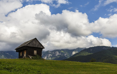 Stunning rural farm with old wooden hut in Bran, Transylvania, Romania