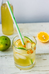 Fresh Ginger lemonade over white wooden background